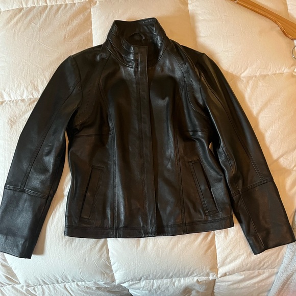 Quince 100% Black Leather Stand-Collar Jacket
Size Medium
Paid $225
NWOT - Picture 2 of 3